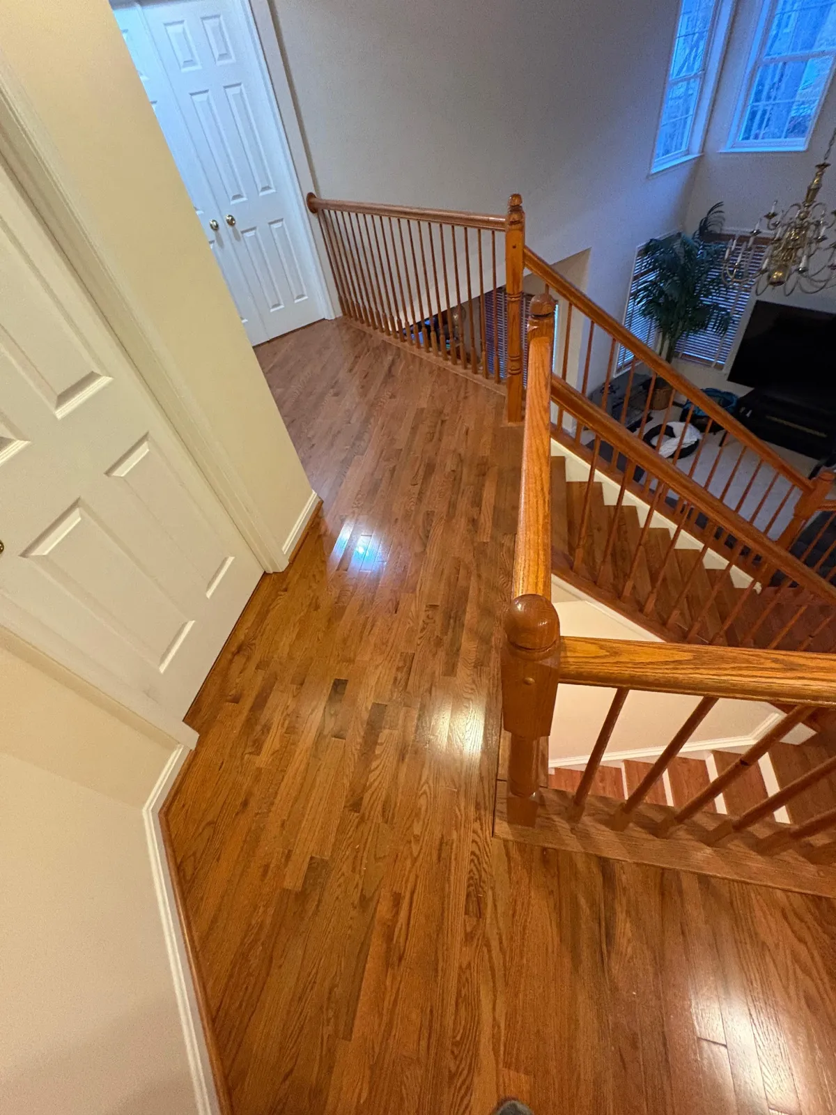 Refinished hardwood staircase and landing
