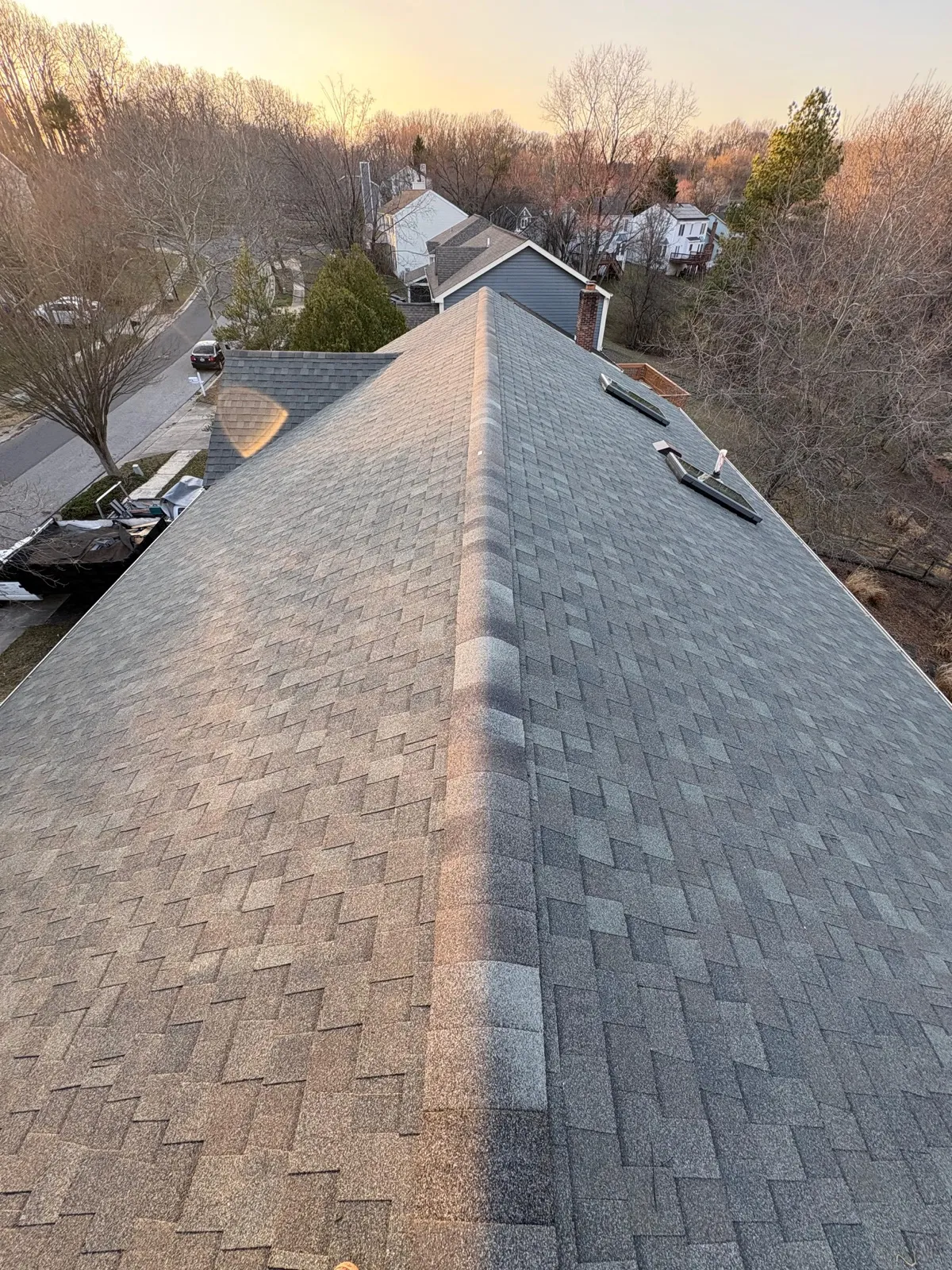 Roof at sunset over a residential home
